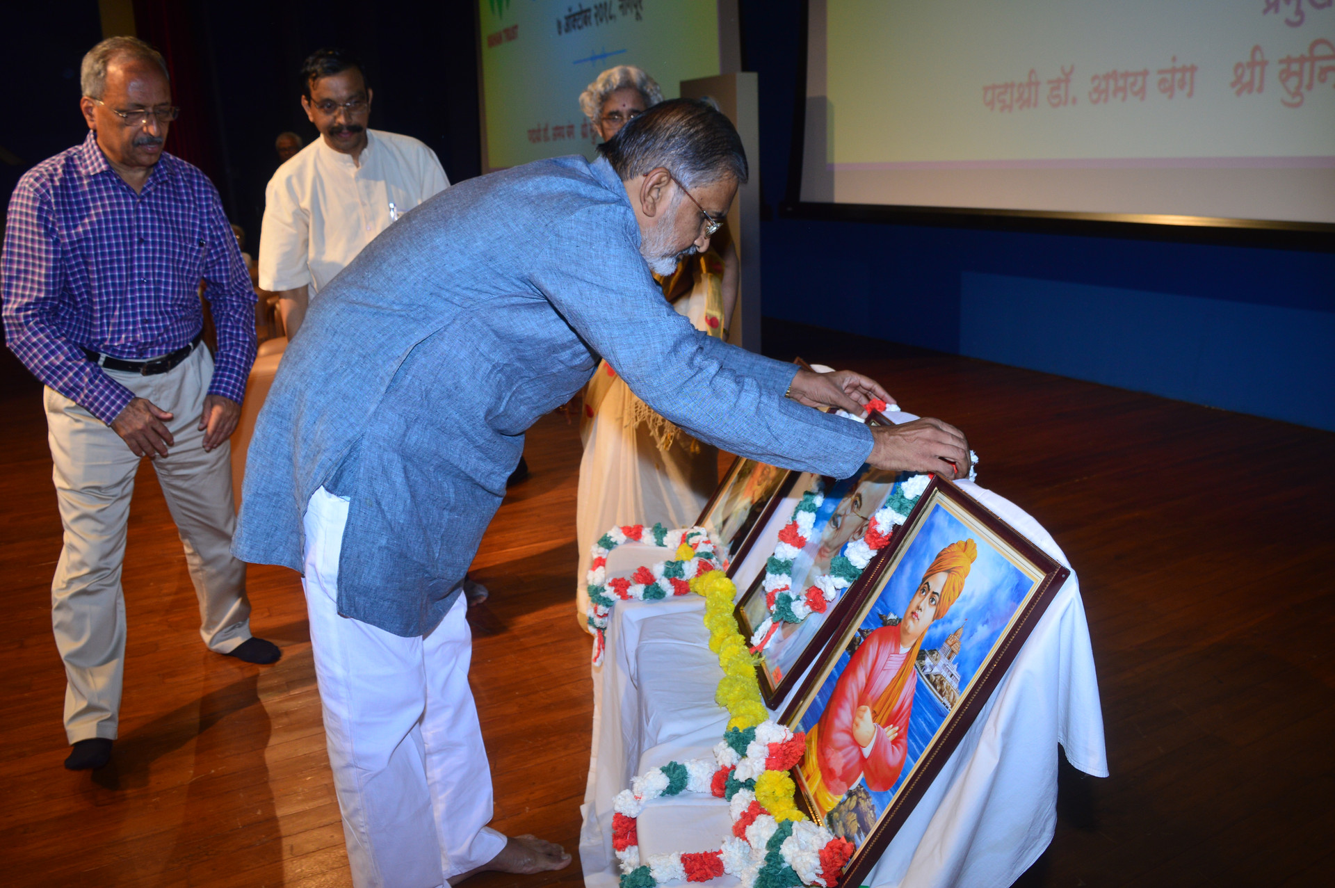Dr Abhay Bang offering respect